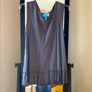 Sleeveless top with ruffle bottom